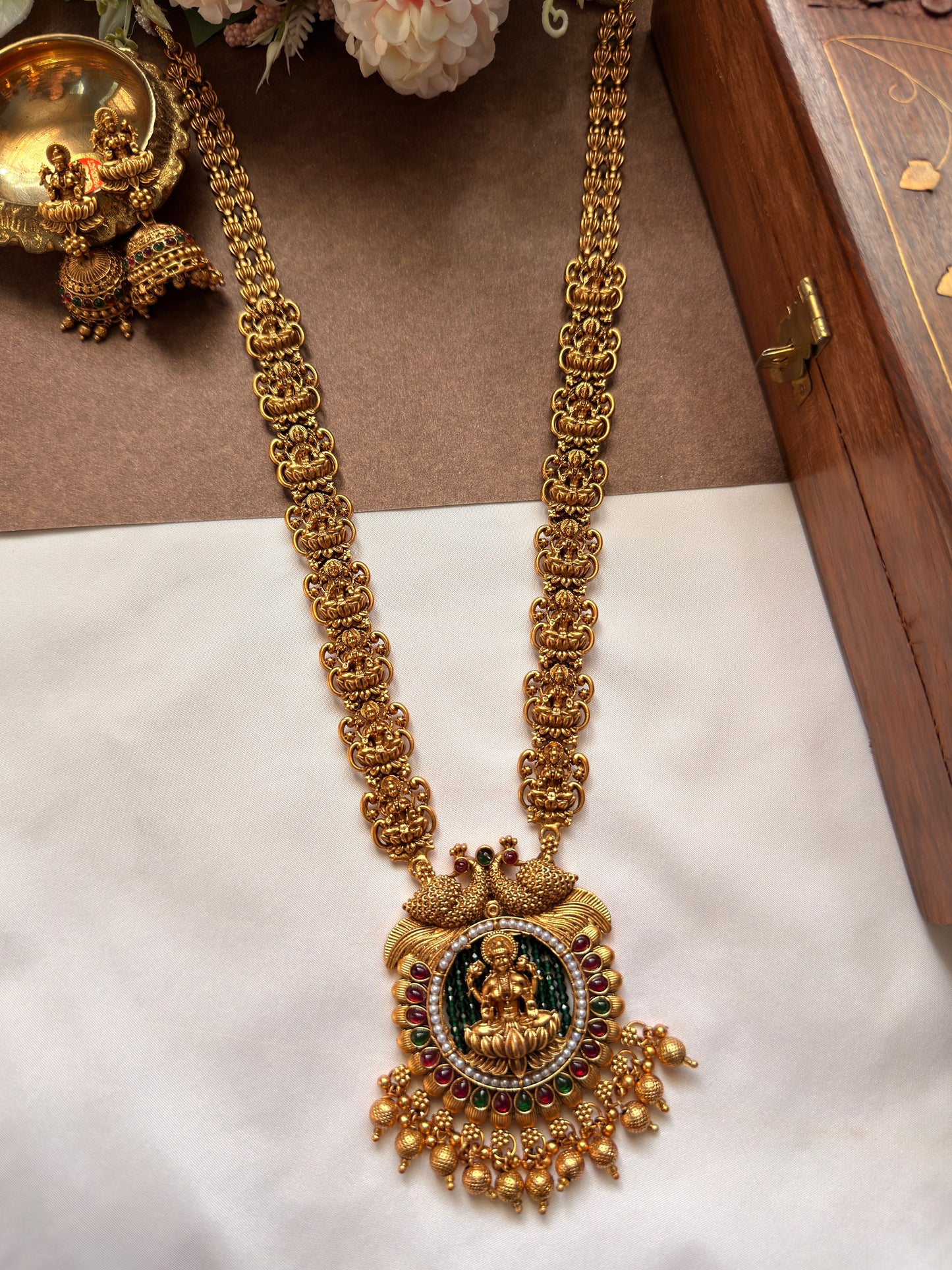 Lakshmi & peacock Long Haram with Green Beads Background