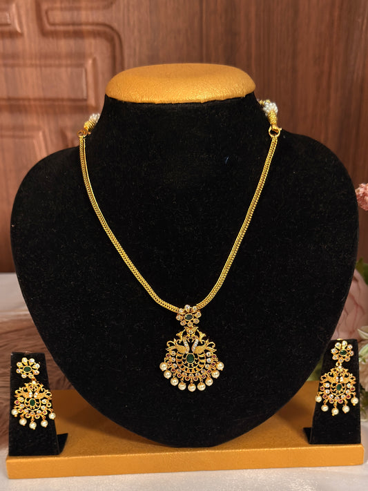 Green Peacock with Pearl